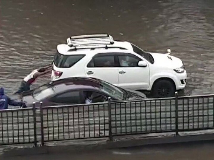 Mumbai rains, Heavy rainfall continue to lash city , traffic affected, water-logging, trains rescheduled Mumbai Rains: Heavy Overnight Downpour Throws Life Out Of Gear; Train Services Affected