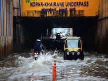 Mumbai Rains In Pictures: Water-Logged Streets, Traffic Jams, Cancelled Trains Bring City To A Halt