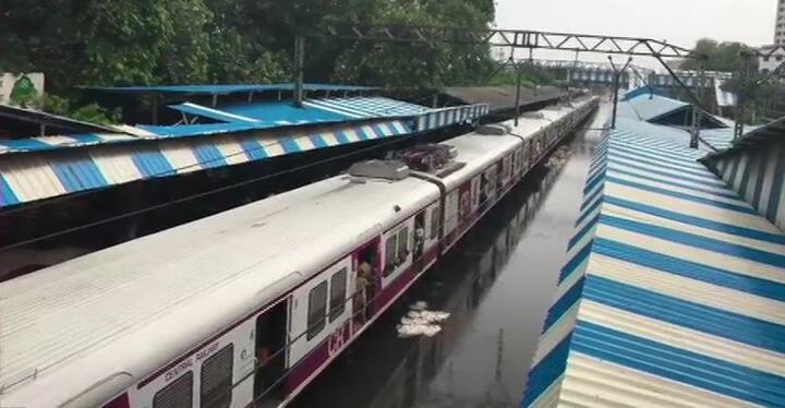 Railway tracks submerge at Sion railway station, after heavy rains in the area.