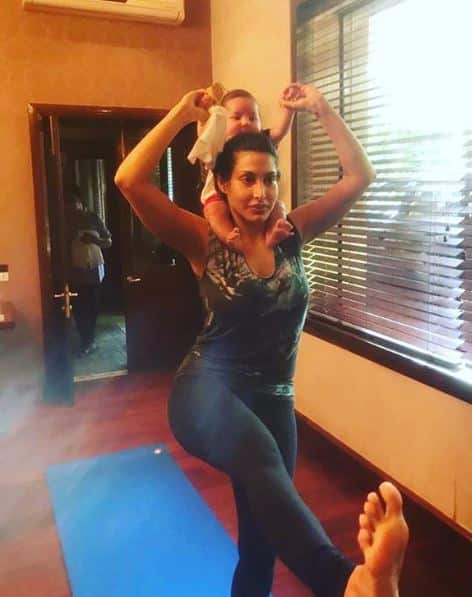 Priya posted this super-cute pic working out with newborn son when he completed 4 months on 20th Apirl , 2019