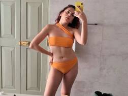 EX Bigg Boss Contestant Nitibha Kaul FLAUNTS Her Fit Body In An Orange Bikini!