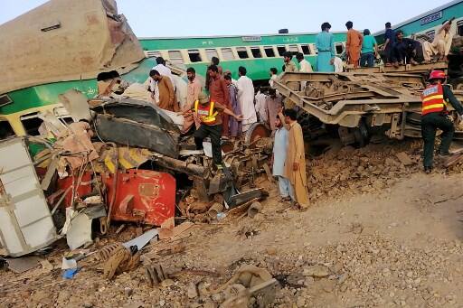 He said that heavy machinery was being used to rescue passengers who were stuck in the train, adding that they were being provided with food and water. Authorities said the Pakistan Army was also taking part in the rescue efforts. The engine of the Akbar Express was completely destroyed in the accident while three compartments were also damaged, police said. (Photo by STR / AFP)