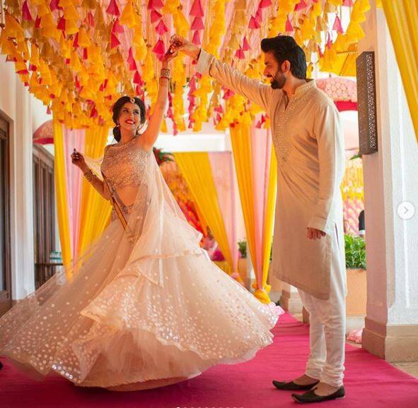 Popular TV actress Charu Asopa recently tied the nuptial knot with Sushmita Sen's brother, Rajeev Sen in Goa. In fact, the newlyweds have just comeback from their mini honeymoon in Thailand. And now the newlyweds shared a series of unseen pictures from their haldi ceremony, where the duo is all glowing in the hues of yellow, check out the pictures here.
