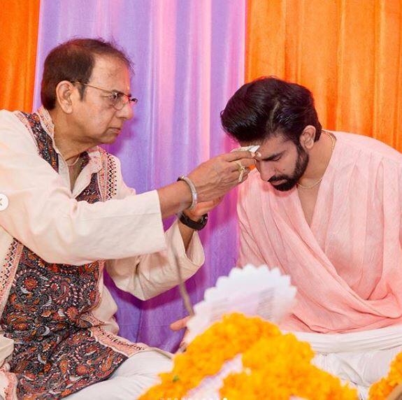 Rajeev's father doing the rituals