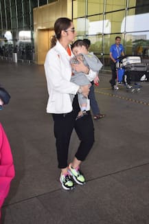 PHOTOS: Sania Mirza Carrying Her Sleepy BABY BOY Izhaan Mirza Malik At The Airport  Is a Sight To Behold!