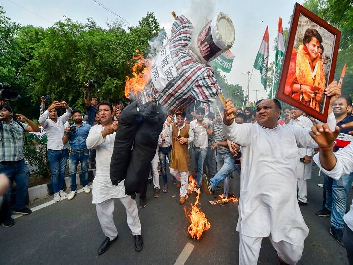 Congress activits protest outside BJP headquarters in New Delhi after party's General Secretary Priyanka Gandhi Vadra was detained on her way to Sonbhadra, where 10 people were gunned down this week earlier this week. (Image: PTI)