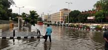 SEE PICS | Rain Lashes Parts Of Delhi-NCR, Triggers Traffic Jams; Temp Dips To 27°C