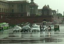SEE PICS | Rain Lashes Parts Of Delhi-NCR, Triggers Traffic Jams; Temp Dips To 27°C