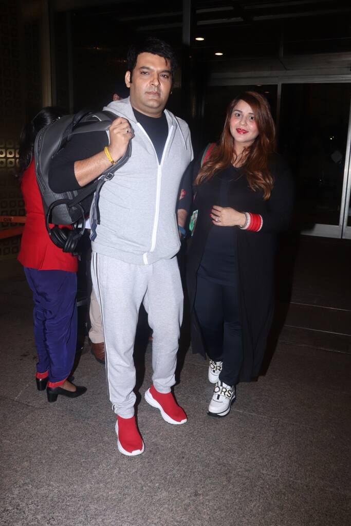 The couple walked hand-in-hand and were all smiles as they posed for the shutterbugs.