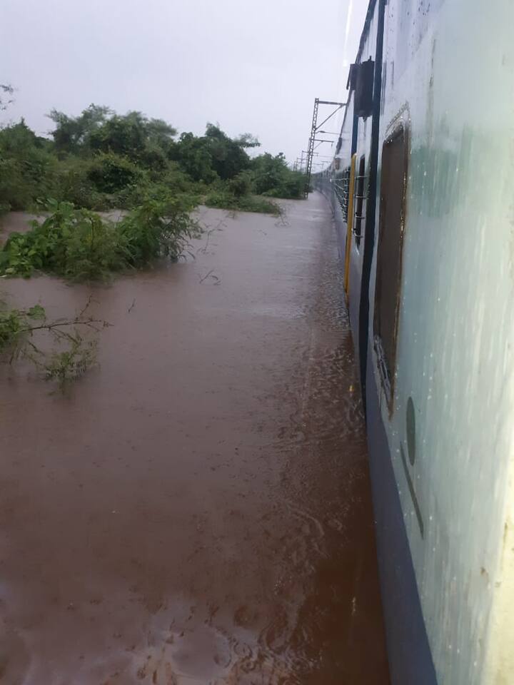 The train stopped because of flooding of the railway tracks