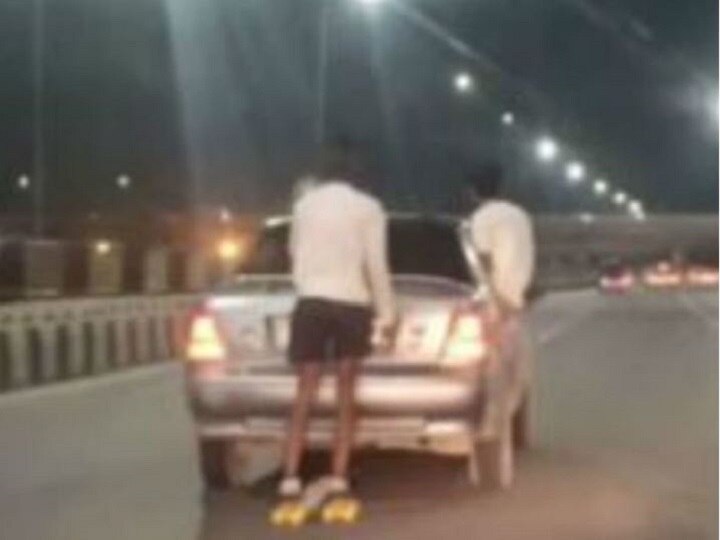 Traffic Police Fines Two Men After Video Of Their Stunts On Moving Car Surfaced On Social Media Traffic Police Fines Two Men After Video Of Their Stunts On Moving Car Surfaced On Social Media