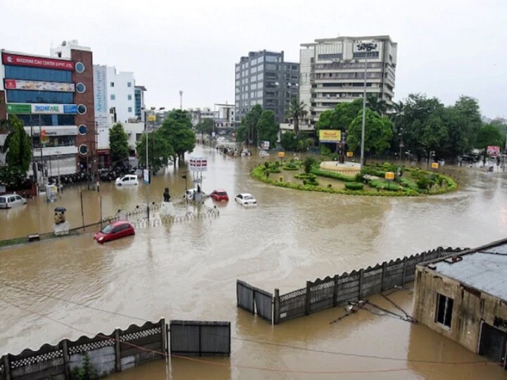 Vadodara flood Gujarat crocodile Vijay Rupani Heavy Rains Cripple Vadodara; Crocodile Seen Swimming Near Housing Society