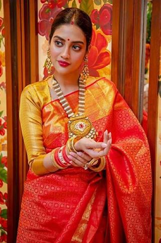 IN PICS: Newly Married Actress-MP Nusrat Jahan Looks RESPLENDENT As She Gets DECKED UP For Her First Hariyali Teej Post Wedding!