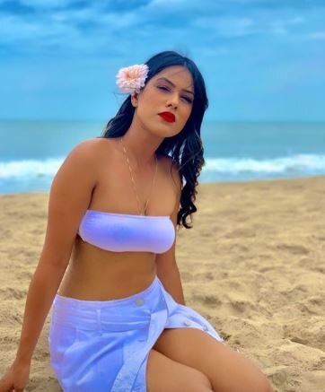 PICS & VIDEO: TV Actress Nia Sharma Is Too Hot To Handle In A White Bandeau Bikini, Button-Down Skirt And Bold Red Lips!