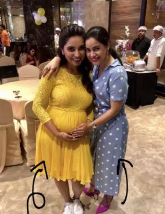 Mommy-to-be flaunting her baby bump as Sumono poses with her