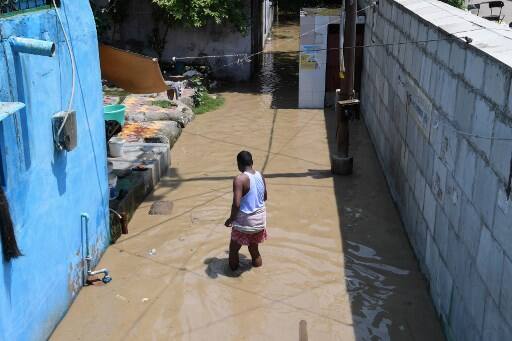 On Monday, Chief Minister Arvind Kejriwal said the water level in the river is likely to rise further with more discharge from the Hathnikund barrage by neighbouring Haryana. (Photo by Sajjad Hussain / AFP)