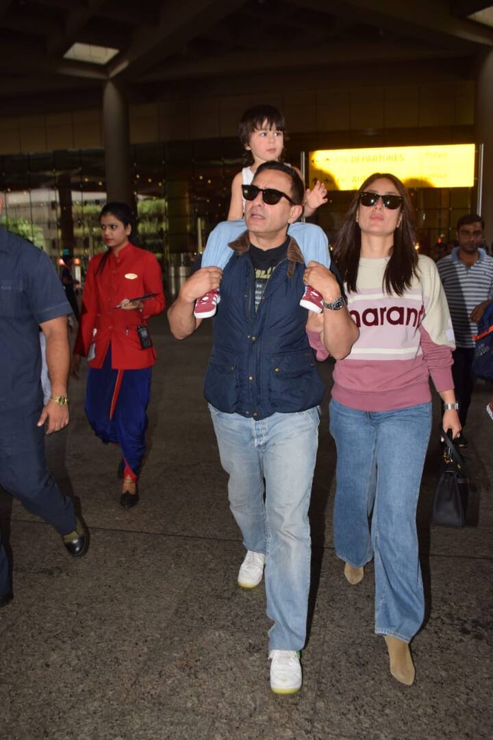 Kareena-Saif and their superstar toddler were all smiles for the paparazzi as they returned from London