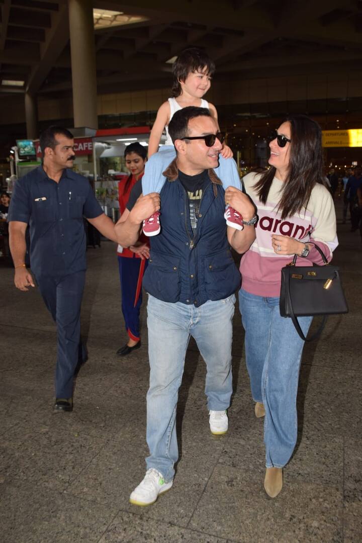 Kareena opted for a cool airport look and was seen in a wide denim and pink stripped sweatshirt 