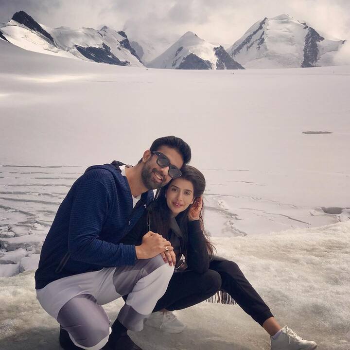 Rajeev and Charu were beaming with joy as they posed for the cameras, with the Swiss Alps in their background.