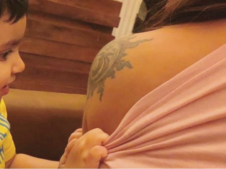 Esha Deol's daughter Radhya Takhtani checking out her shoulder back tattoo 'Om' is adorable! Esha Deol's Daughter Radhya Takhtani Checks Out Her Shoulder Tattoo 'Om' & Her Expressions Are Adorable!