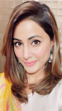 IN PICS: Hina Khan Enjoys Modak As She Celebrates Ganesh Chaturthi With Boyfriend Rocky Jaiswal; Looks Resplendent In Her Ethnic Wear!