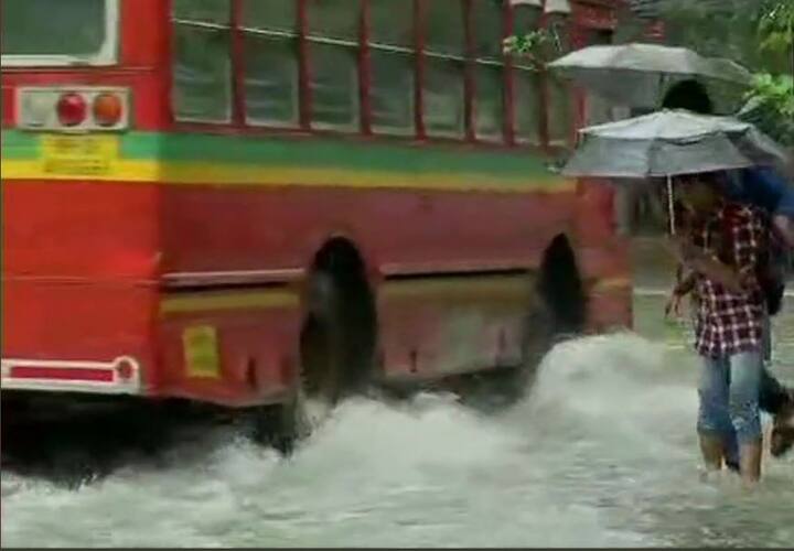 The local train services have been hit due to water impoundment at tracks./ Image: ANI
