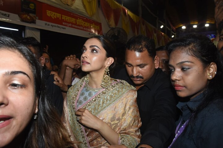 Deepika looked every bit gorgeous as she made her way through the massive crowd at the Ganesh Pandal.