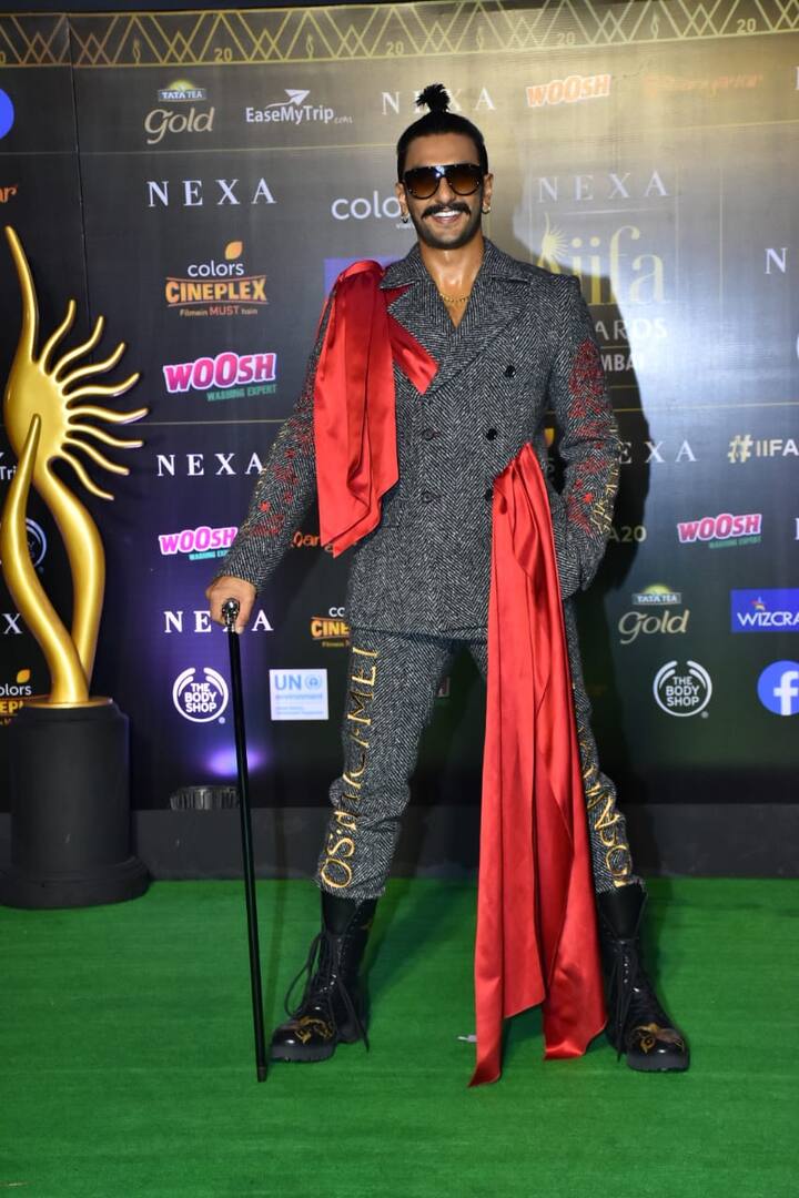 On the other hand, Deepika's husband and actor Ranveer Singh was dressed up in a grey suit that had a long and heavy red bow attached to it