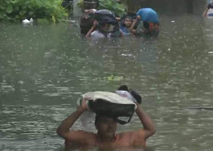 People have been forced to stay indoors as most of the roads were water-logged. (ANI Photo)