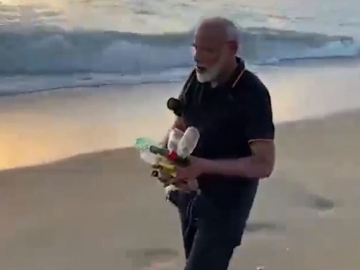 PM Goes Plogging! Modi Picks Up Plastic Waste, Garbage From Mamallapuram Beach; Watch Video WATCH VIDEO: PM Goes Plogging! Modi Picks Up Plastic Waste, Garbage From Mamallapuram Beach