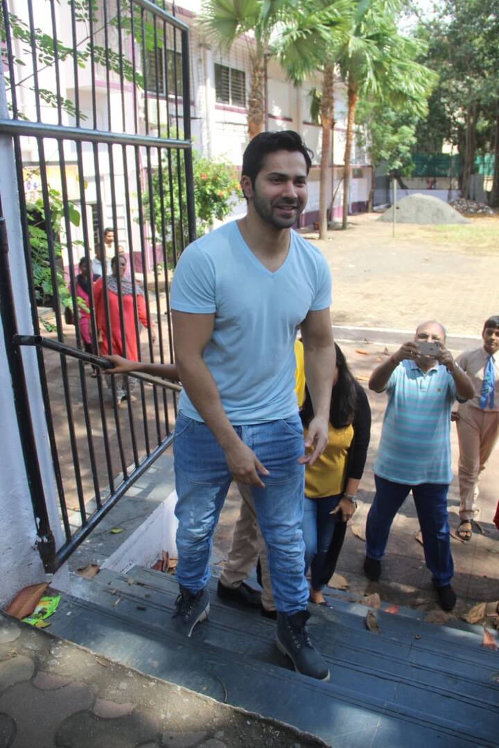 Bollywood actor Varun Dhawan was snapped by the paparazzi after casting his vote.