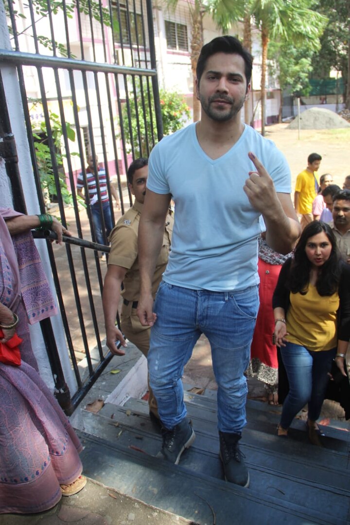 Varun Dhawan flaunted his inked finger for the shutterbugs at the polling booth.
