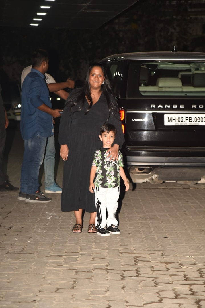 Salman Khan's sister & Aayush Sharma's wife Arpita Sharma Khan too attended Helen's birthday bash. Arpita, who is expecting her second child with Aayush, flaunted her baby bump as she got snapped with son Ahil Sharma.(Photo: Manav Manglani)