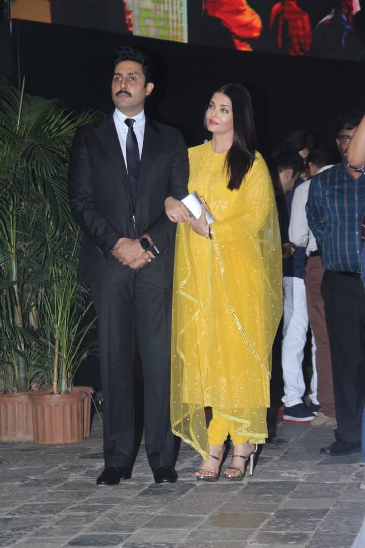 Abhishek Bachchan complimented his wife in a black suit. The actor sported a moustache.