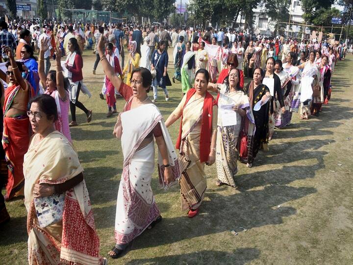 Activists of All Assam Students Union (AASU) along with different organizations take part in a Satyagraha procession demanding withdrawal of the Citizenship Amendment Act (CAA), in Guwahati. (Image: PTI)