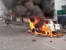 PICS: Vehicles Torched In Lucknow; Several Detained In Delhi & Bengaluru During Anti-CAA Protests