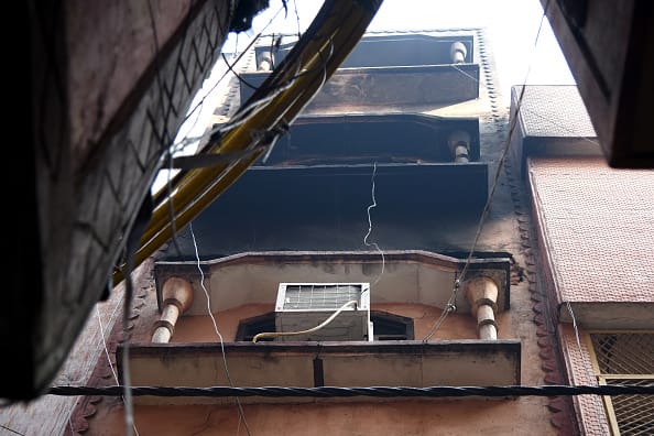 Gas cutters had to be employed to remove the iron grilles. Thirty-five fire engines reached the location and extinguished the fire with an estimated 150 firemen involved who were able to rescue 63 people. A team from the National Disaster Response Force was deployed to assist the fire department in the rescue work. (Getty Images)