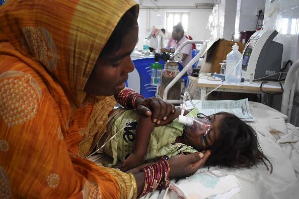 In June 2019, an outbreak of acute encephalitis syndrome occurred in Muzaffarpur and the adjoining districts in Bihar state of India, amidst the second-longest heatwave in the region, resulting in deaths of more than 100 children, mainly due to hypoglycemia. (Getty Images)