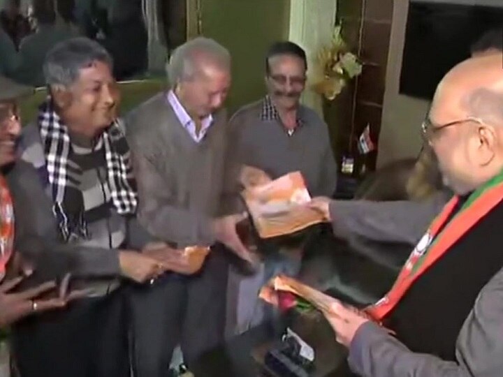 Amit Shah Visits Locals In Delhi To Create Awareness On CAA As A Part Of Door-To-Door Campaign Delhi: Shah Visits Locals To Create Awareness On CAA As Part Of BJP's Door-To-Door Campaign