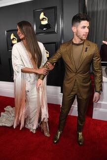 Grammys 2020 Red Carpet Pics: Priyanka Chopra Flaunts Her Pierced Belly Button In Risque Neckline Gown Posing With Hubby Nick Jonas