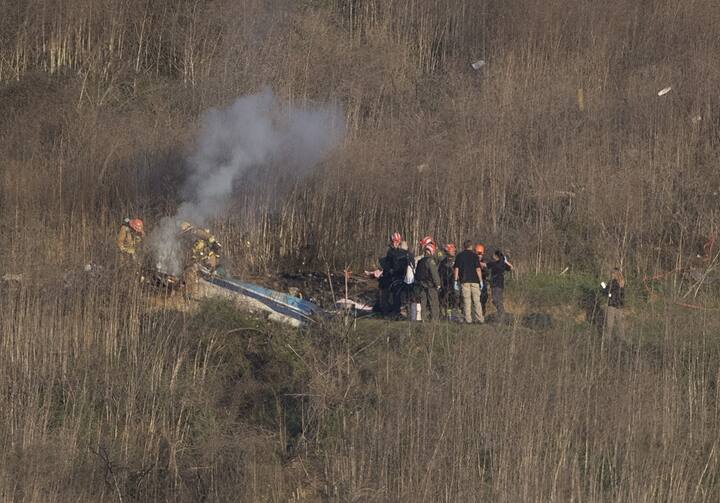 The 12-seater Sikorsky S-76B helicopter was flying passengers from Orange County, Los Angeles to Mamba Sports Academy in Thousand Oaks for a basketball game when it rammed into a mountainside in Calabasas. PIC/AFP.