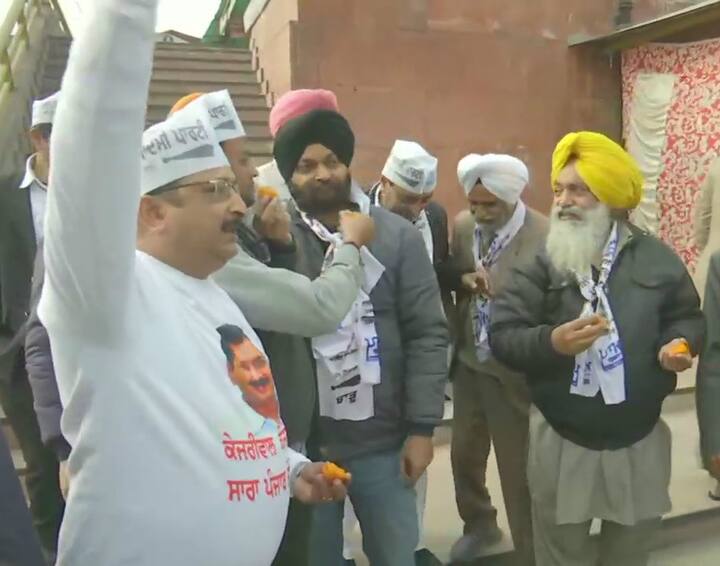 Here's a picture of AAP members dancing ahead of the final results. (Photo Credit: ANI)