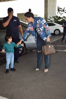 PICS: Kareena Kapoor & Taimur Ali Khan Make A Style Statement With Their Airport Look