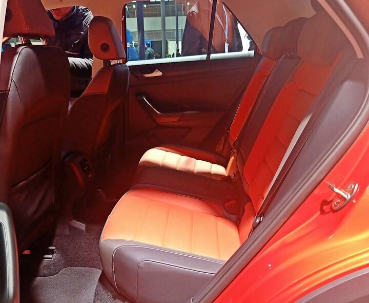 Inside it is a Volkswagen and by that we mean solid build quality which impresses even more now. Being a CBU it is completely imported and that brings in a spectacular build quality. The design is typically VW but the colours which are added to the cabin looks great. Space is decent but less than some others with focus on design, especially the sloping roof but two at the back is possible while the boot is big enough.