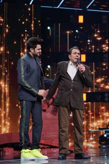 PICS: Maniesh Paul's Jai Veeru Moment with Dharmendra On Sets Of Sa Re Ga Ma Pa Li’l Champs