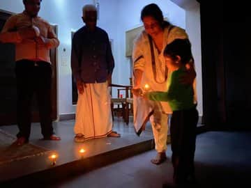 Finance Minister Nirmala Sitharaman lights a diya to observe a moment of hope . (Pic Courtesy: ANI)