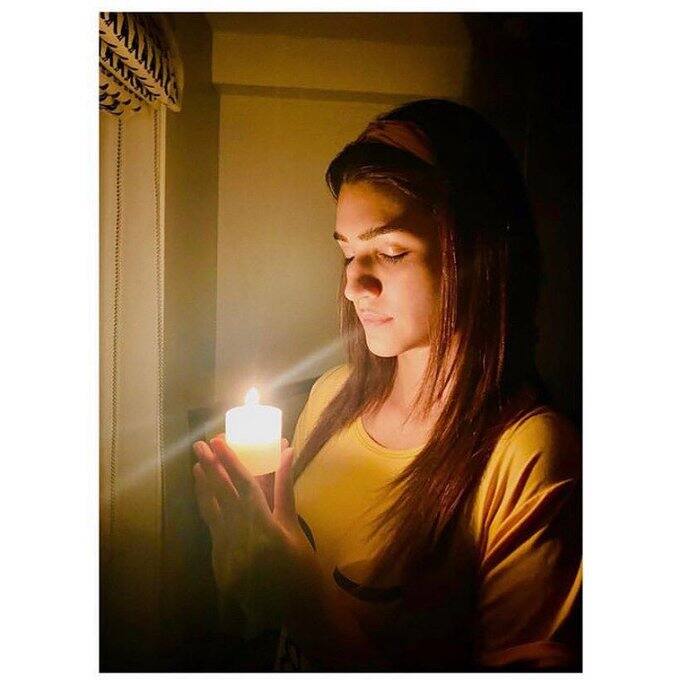 Kriti Sanon lights a candle for hope in fight against Corona. (Image Source: Instagram)