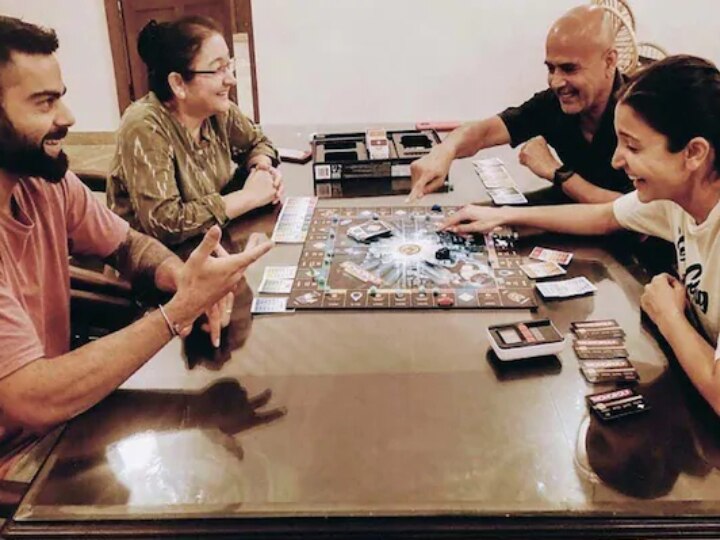 Any Guesses Who Won?: Anushka Sharma Posts Photo With Virat & Family Playing Monopoly Any Guesses Who Won?: Anushka Sharma Posts Photo With Virat & Family Playing Monopoly