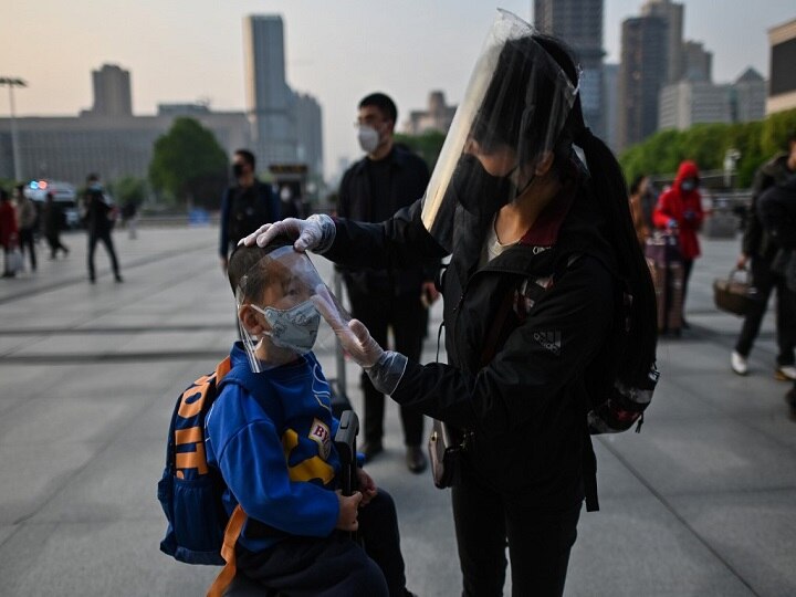 Coronavirus Pandemic: China Lifts 76-Day COVID-19 Lockdown In Wuhan; Crowd Swarm Trains Coronavirus Pandemic: China Lifts 76-Day COVID-19 Lockdown In Wuhan; Crowd Swarms Trains