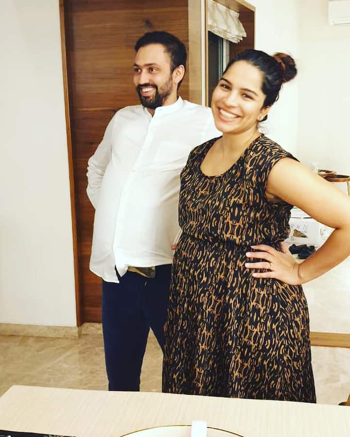 While Shikha flaunted her baby bump, her husband also flaunted his belly by enlarging his stomach. Isn't it adorable?